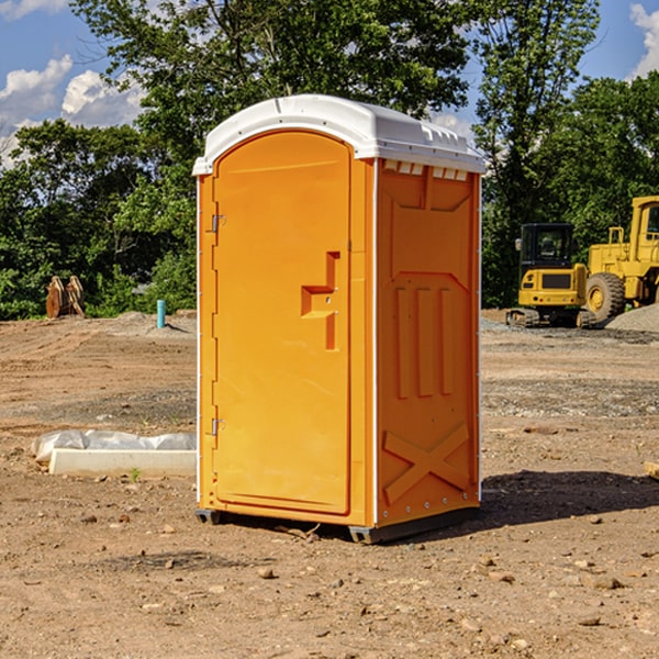 what is the cost difference between standard and deluxe portable restroom rentals in Burdick